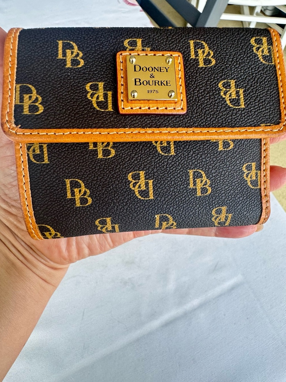 Dooney & Bourke Brown Wallet with Tan Trim and Gold Plate